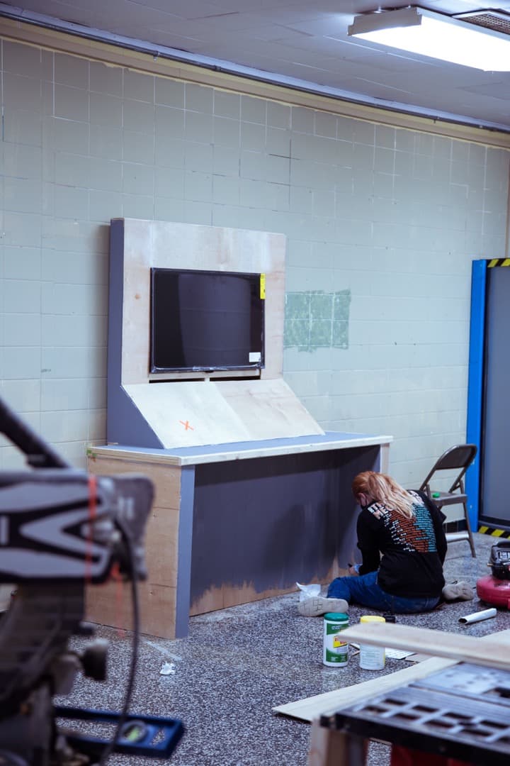 Behind the scenes photo 49 from Clone Cops production showing crew building the clone lab for clone cops